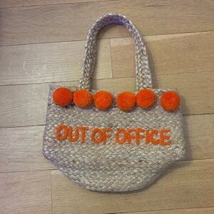 One of a kind “Out Of Office” natural tote with orange pom poms